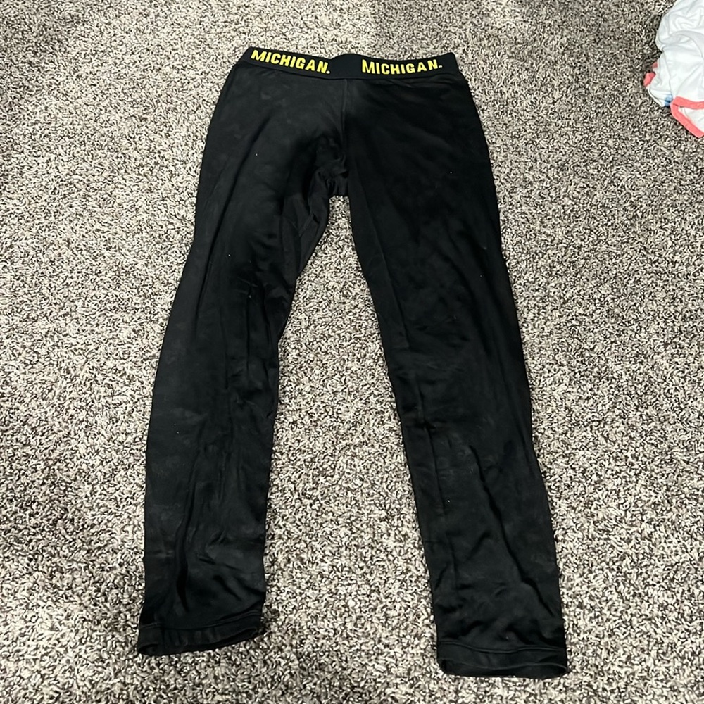 EUC fleece lined Michigan leggings